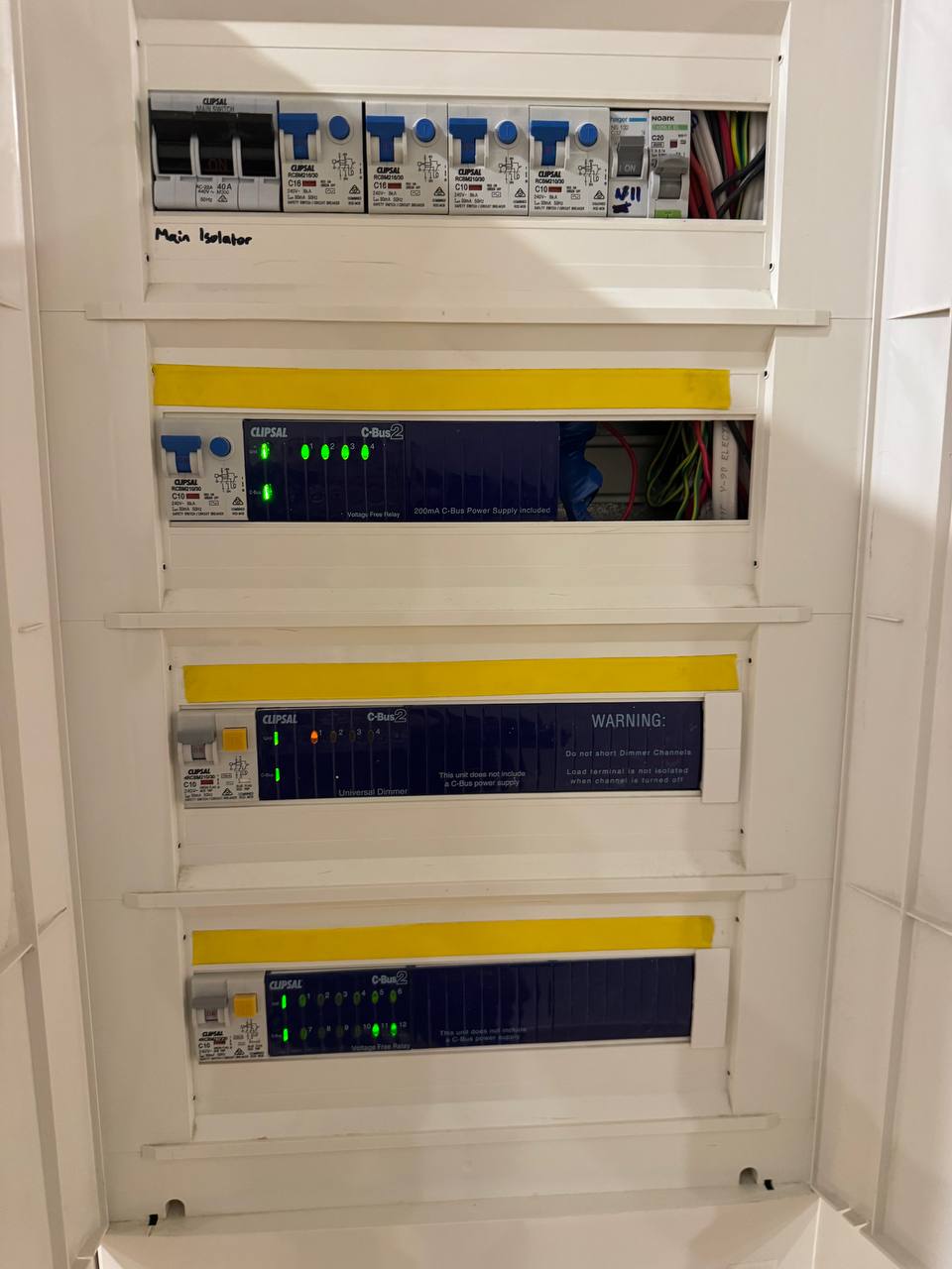 Clipsal C-Bus switchboard with dimmer modules in a Melbourne home
